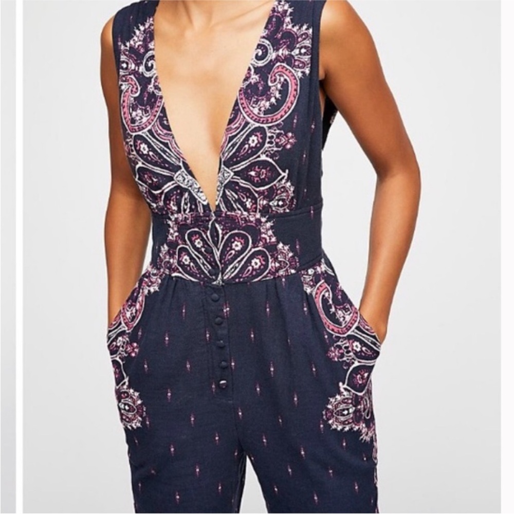 NWT Free people setting sun jumpsuit blue and pink. Plunge v neck and cropped XS